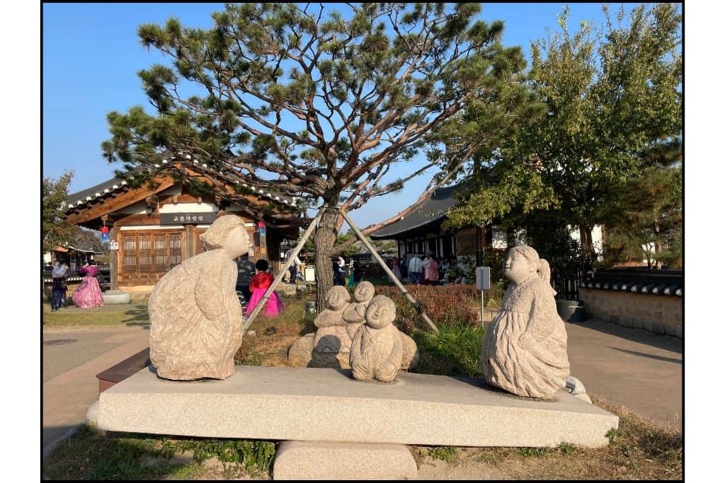 Stone statues of a womn and her child in Gyeongju S Korea