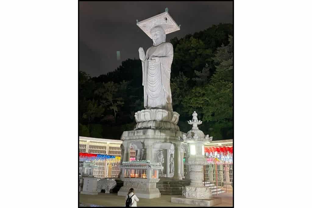 NIghttime photo of the 23m statue of Buddha at Bongeunsa temple in Gangnam