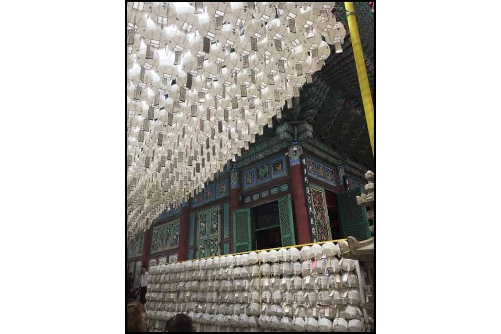 White lanterns decorating a temple at Jogyesa temple, a free activity in Seoul