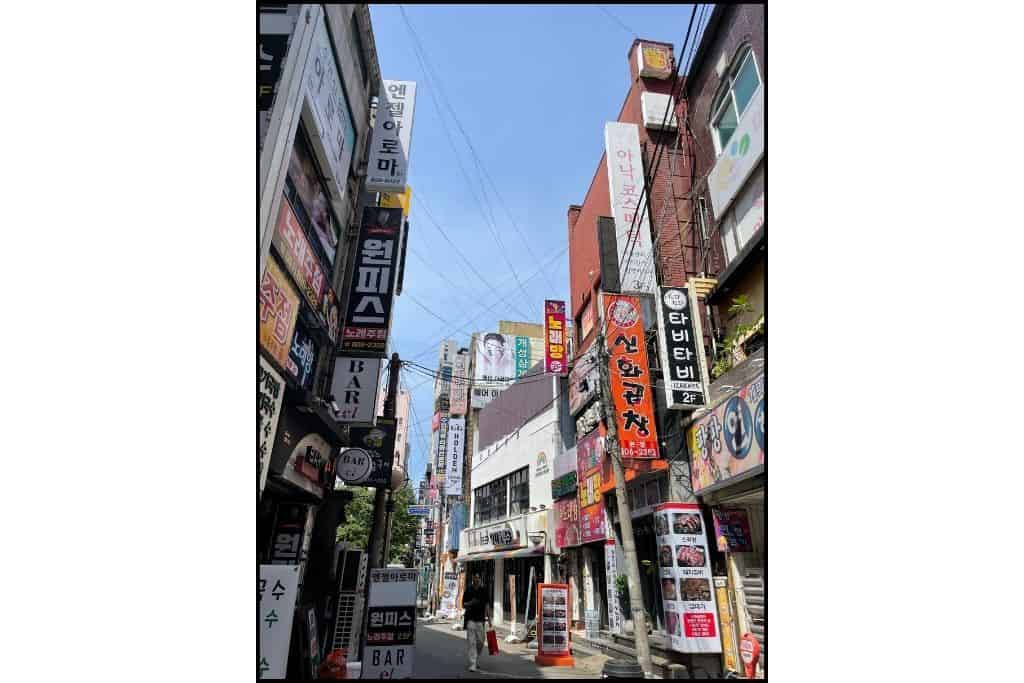 A view of the different signs for Korean business in a multi level building