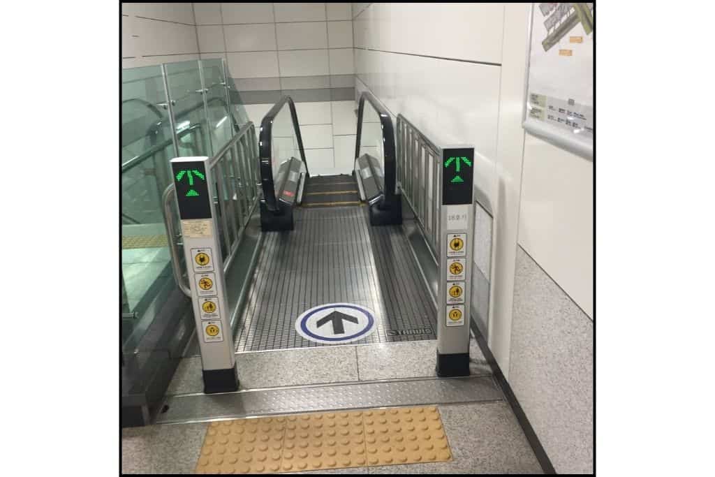 An empty down escalator in the subway in Seoul