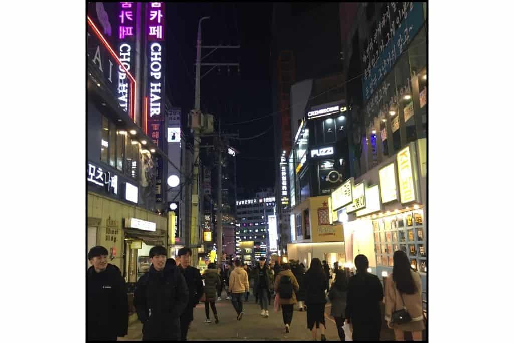A nighttime shot of people out for dinner and drinks in Gangnam.
