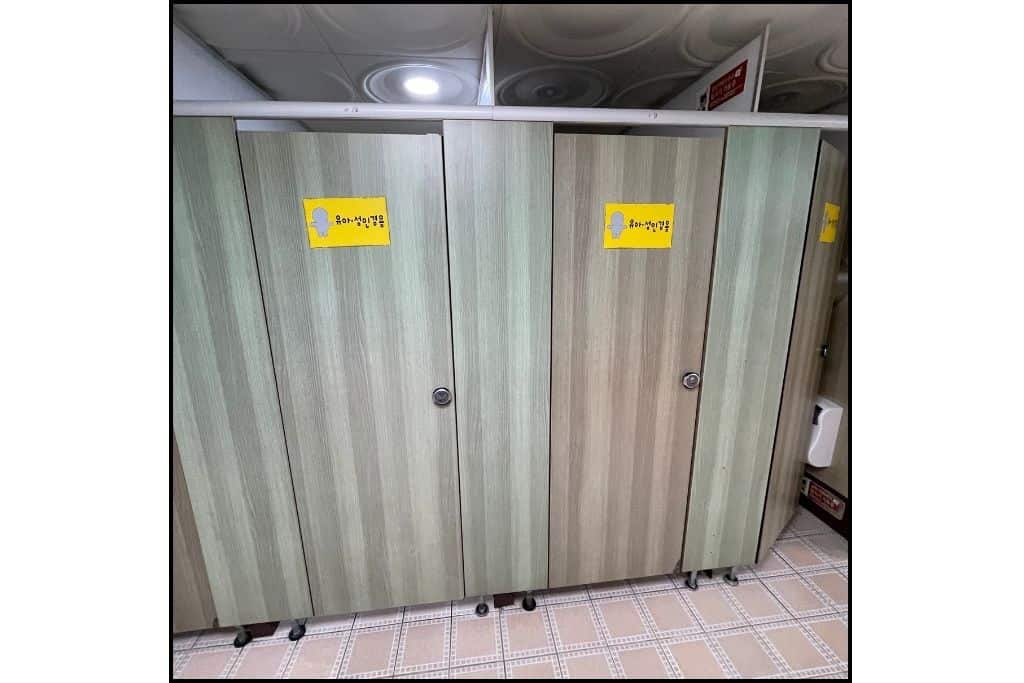 Bathroom doors in a public restroom in South Korea. 