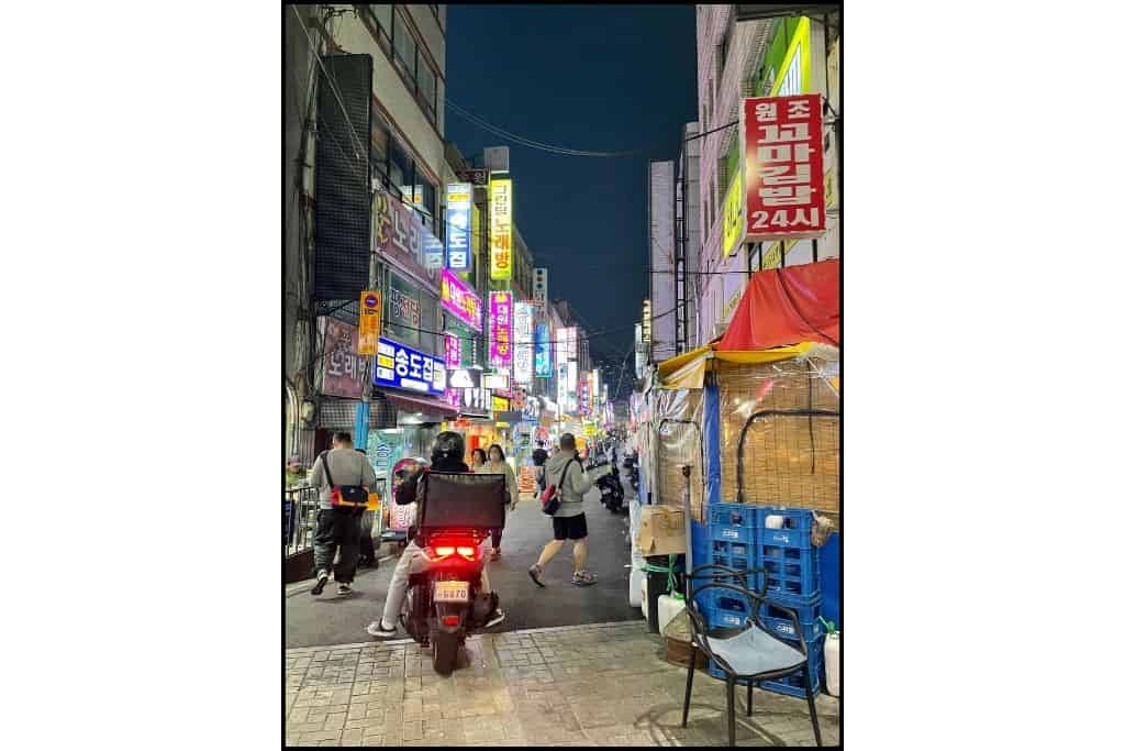 A busy street at night on the Nampo/BIFF Square area of Busan