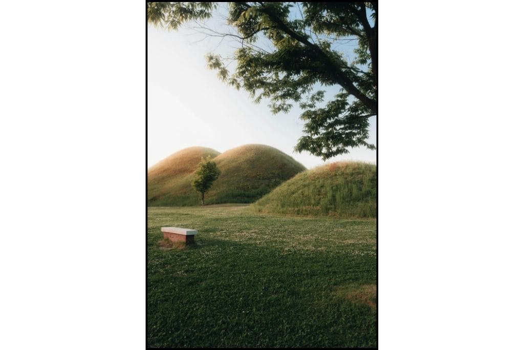 Ancient royal tombs at Daereungwon Tomb Complex in Gyeongju, ideal for a day trip showcasing the historical significance of the site.
