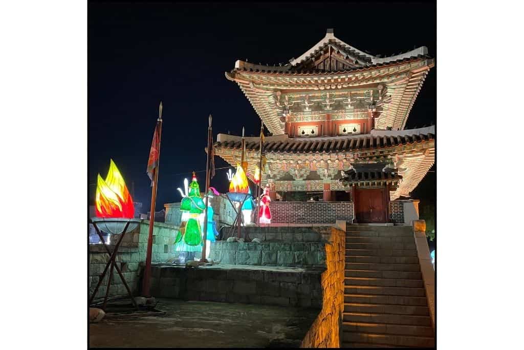 The Jinjuseong Fortress gate lit up at night in Jinju South Korea