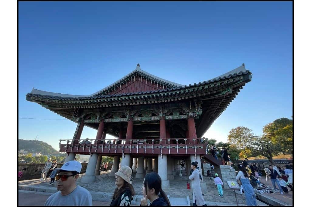 People walking around the Chokseokru Pavilion during a festival in Jinju, an exciting thing to do in Jinju