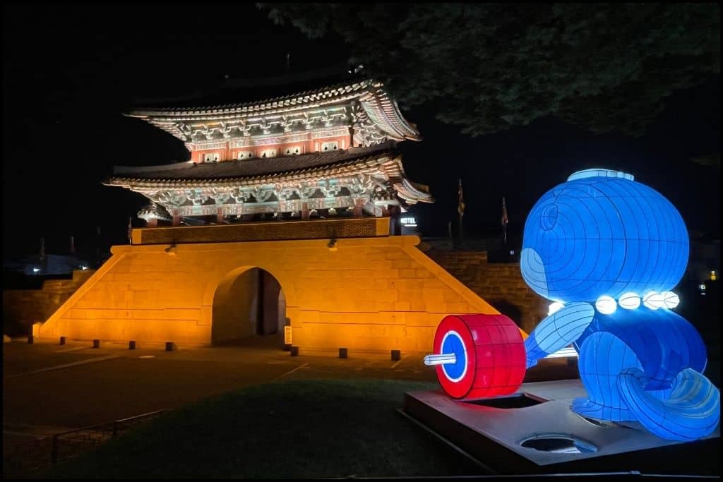 Visiting the Jinjuseong Fortress lit up at night during Lotus Lantern Festival, a fin thing to do in Jinju