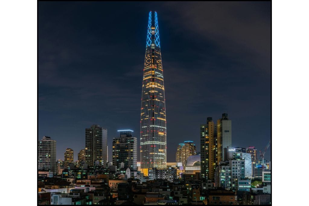 Lotte World Tower lit up against the night sky—a stunning landmark to see when looking for things to do at night in Seoul.