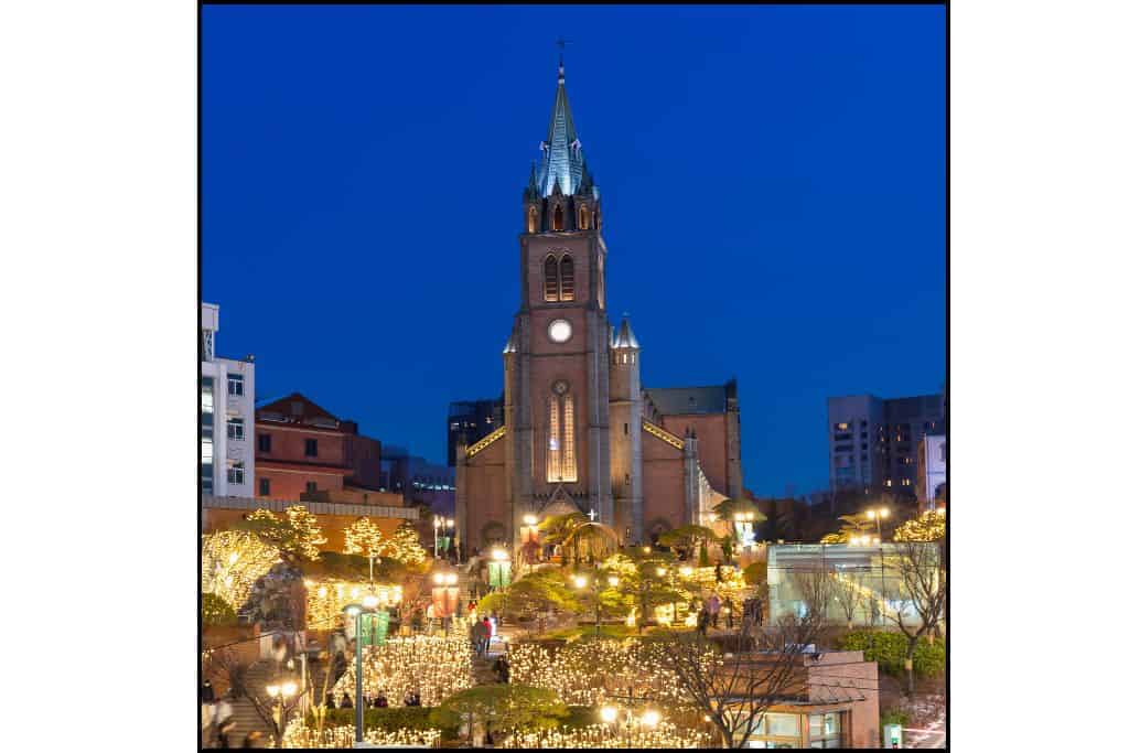 Myeongdong Cathedral beautifully lit up at night, a peaceful spot to visit when exploring things to do at night in Seoul.