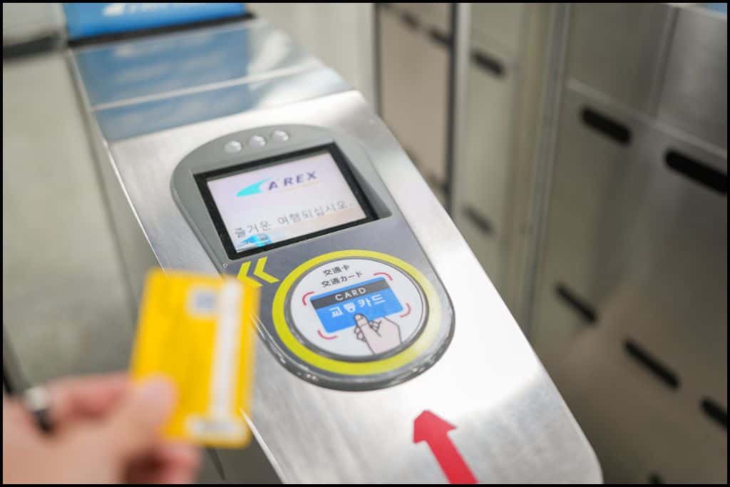 Close-up of a card payment terminal for the AREX train in South Korea, showing the tap-to-pay area for T-money cards 