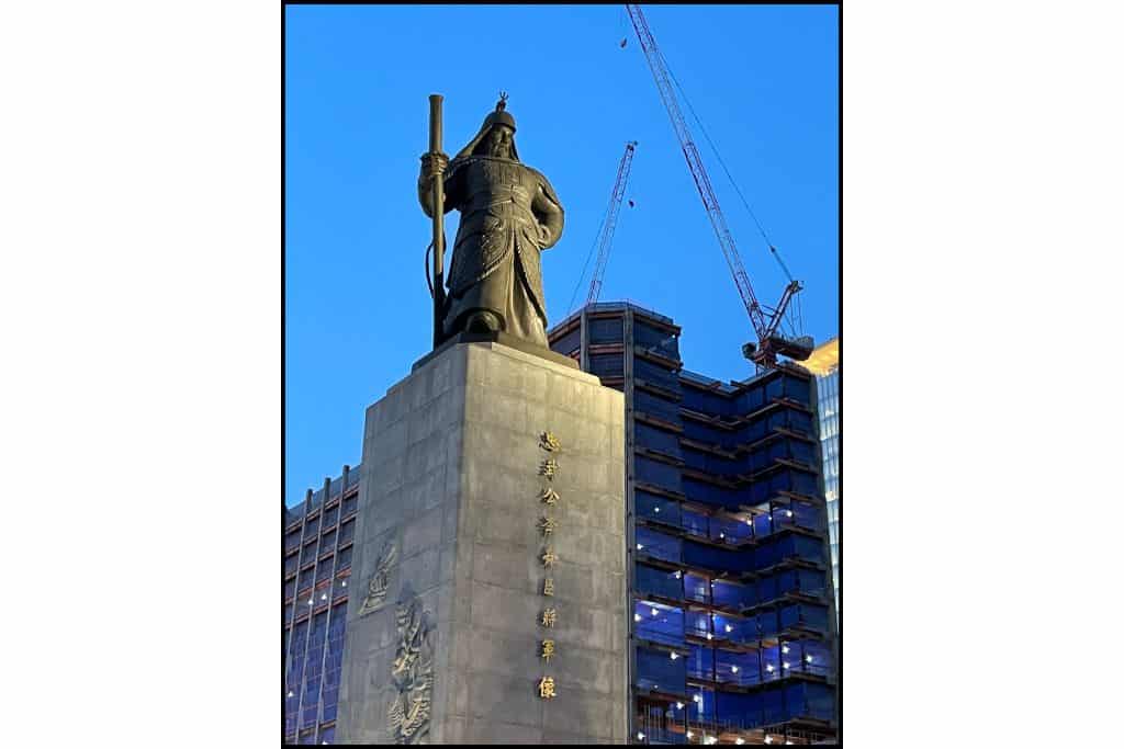 Statue of Admiral Yi Sun-sin at dusk in Seoul, a popular landmark to visit when exploring things to do at night in Seoul