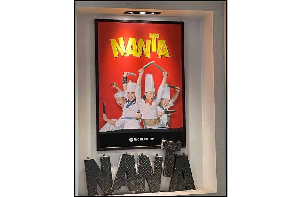 The ferd sign with yellow nad black lettering foer the hilarious comedy show dalled Cooking Nanta.