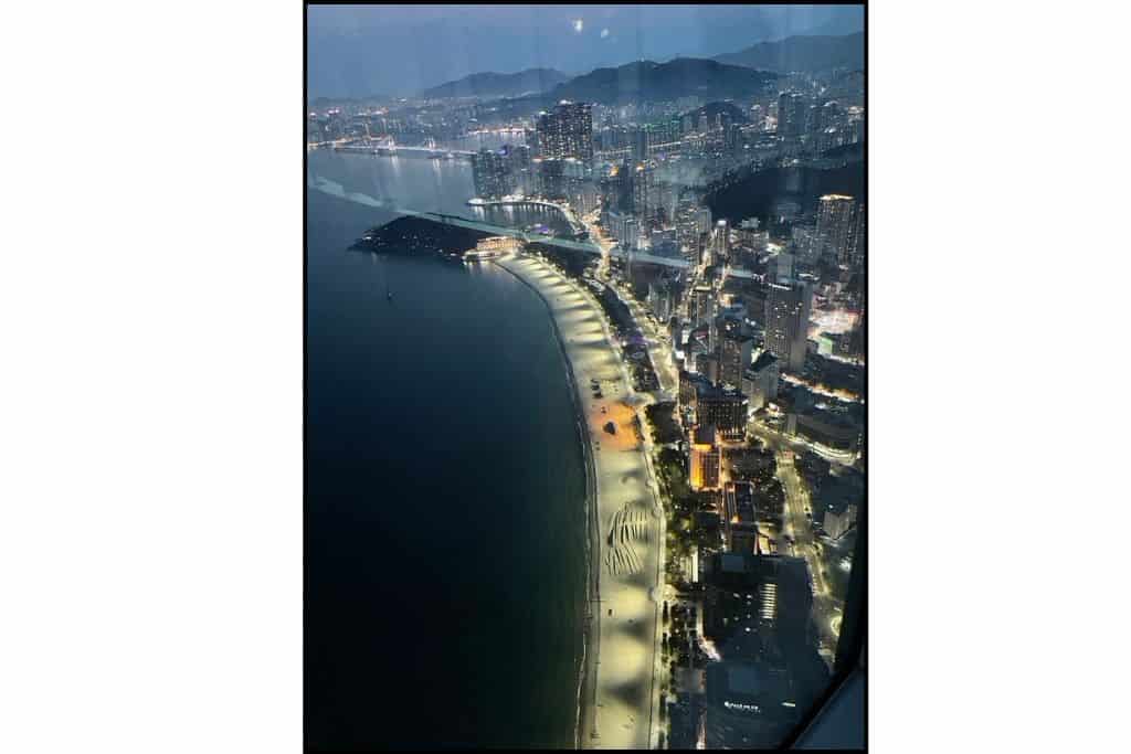 Night view of Haeundae Beach and city lights from BUSAN X the Sky Observatory in Busan.