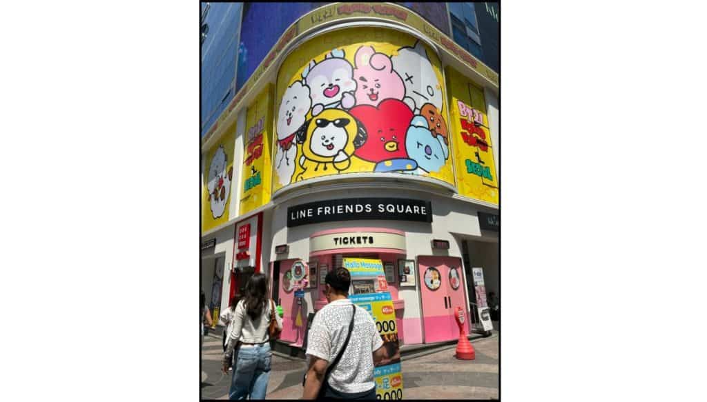 Exterior of LINE Friends Square in Myeongdong featuring large BT21 character displays above the entrance.
