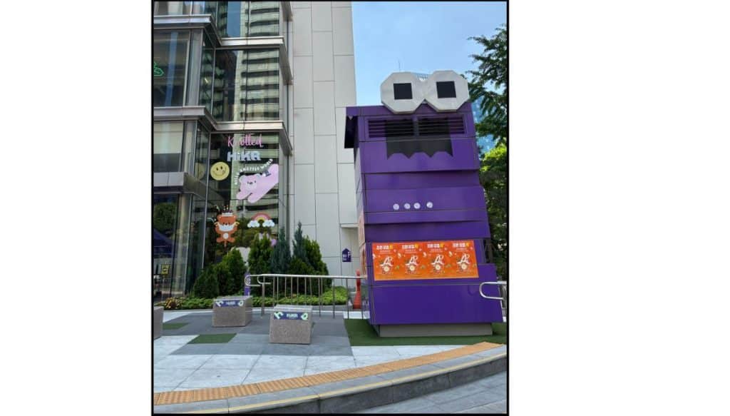 Purple HiKR Ground mascot display outside the Korea Tourism Organization building in central Seoul.