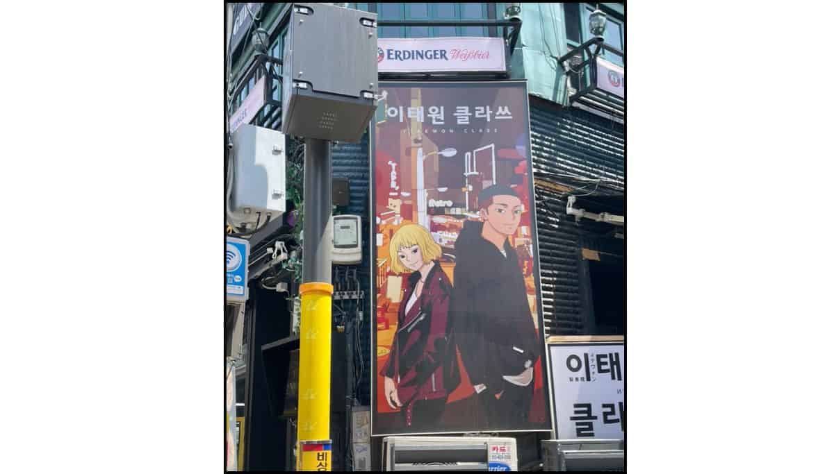 Large Itaewon Class mural featuring illustrated characters on a building in Itaewon, Seoul.