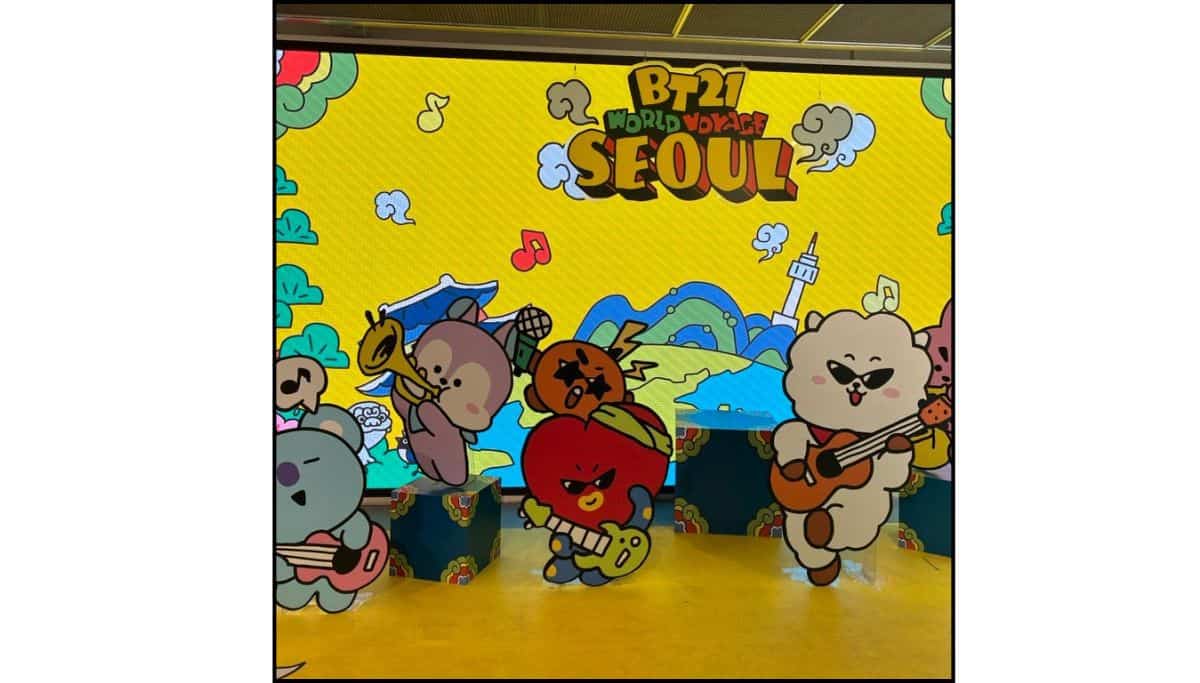 BT21 World Voyage Seoul display with colorful cartoon characters and N Seoul Tower in the background in LINE gFriends store in Myeongdong
